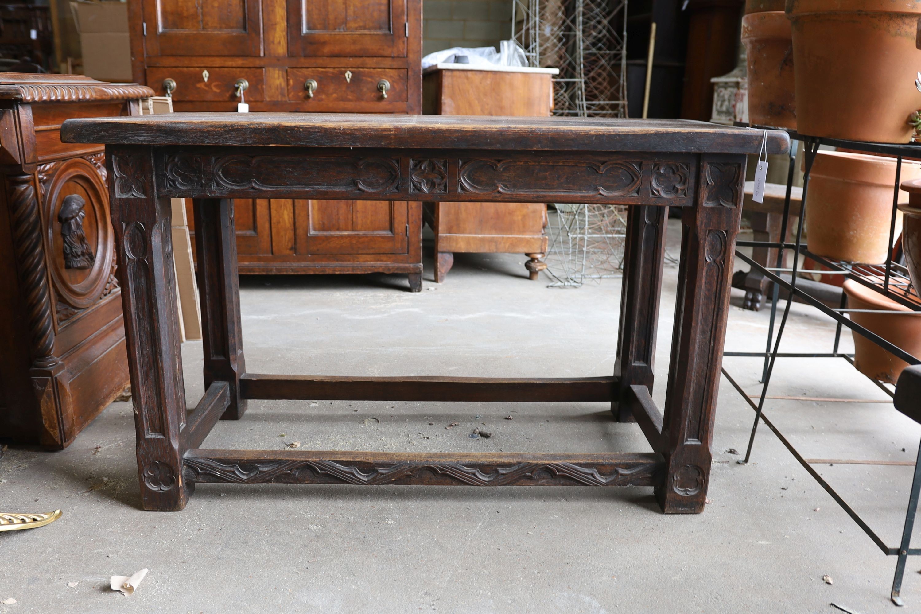 A 17th century style rectangular Gothic oak New England table, width 127cm, depth 59cm, height 77cm